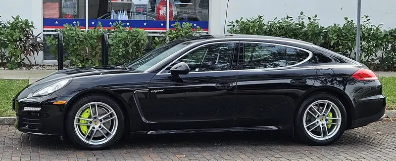 Black Porsche Panamera with deep wax gloss at St Pete Auto Detail
