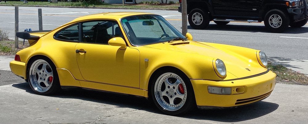 Yellow Porsche 911 Turbo with detailed finish